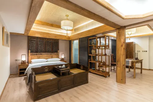 Lijiang Fengyasong Wenjinyuan Chinese Inn · Naxi Guyuan Bilik Photos