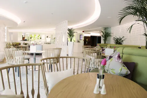 Ramee Grand Hotel and Spa Ristorazione Photos
